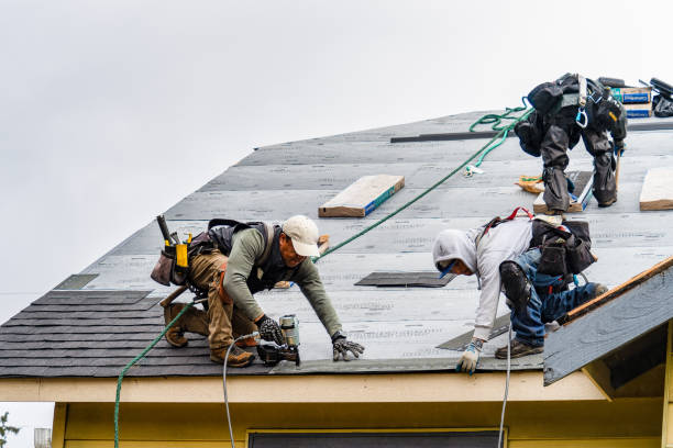 Professional Roofing technician working in Maine, ME